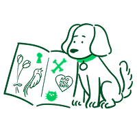 Cachorro segurando uma revista aberta com pequenas imagens de animais