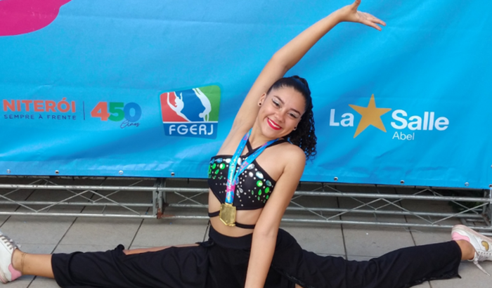 Representar o Brasil em Aracajú-Sergipe de Ginástica Rítmica