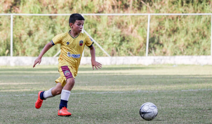 Viagem dos sonhos de um pequeno jogador