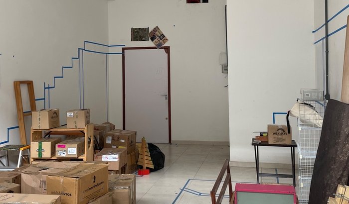 Mudança e instalação da livraria Genipapo