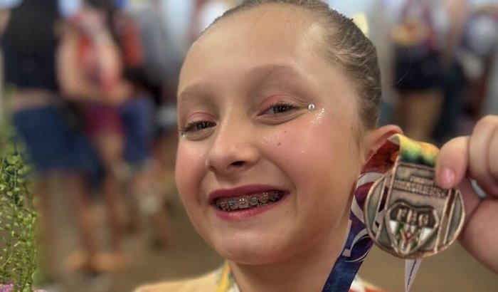 Ajude o Papai Noel a presentear uma ginasta