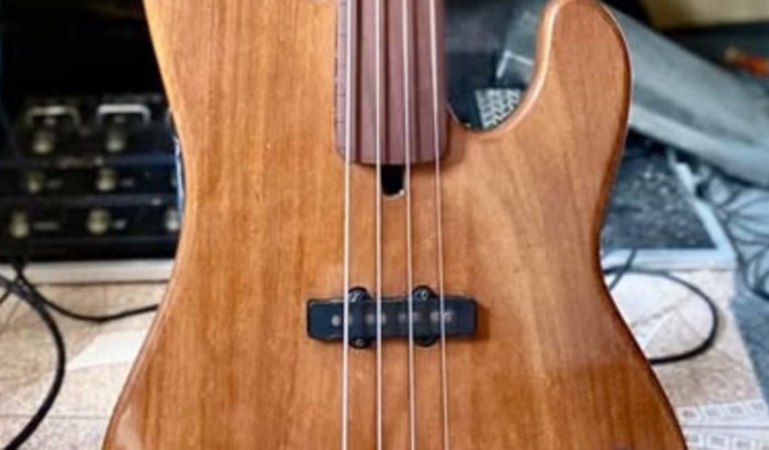 Comprar um Fretless pro Andrézim